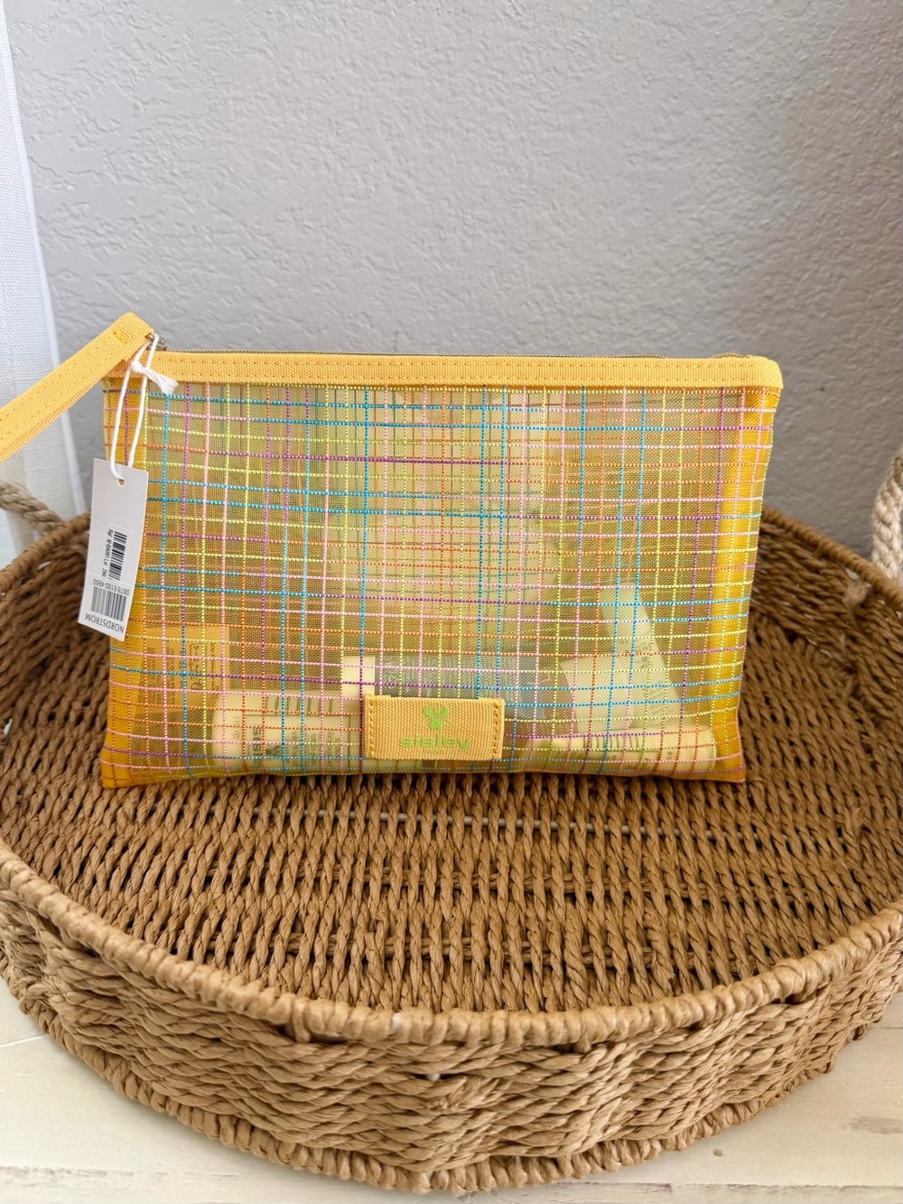 Sisley Pink and Yellow Travel Skincare Set in Grid Pouch